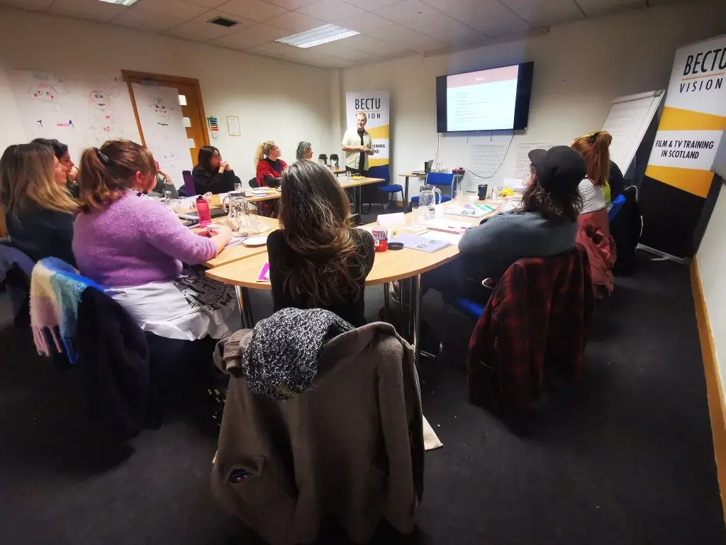 This photograph shows a group of learners taking part in the training course - Scotland's Mental Health First Aid, being led my tutor Paul Burnside