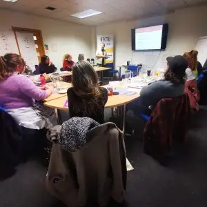 This photograph shows a group of learners taking part in the training course - Scotland's Mental Health First Aid, being led my tutor Paul Burnside