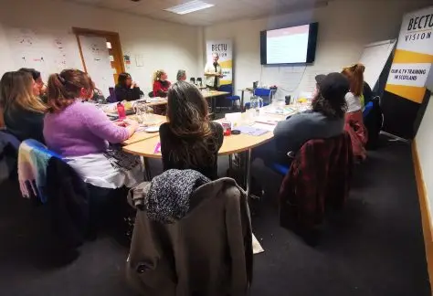 This photograph shows a group of learners taking part in the training course - Scotland's Mental Health First Aid, being led my tutor Paul Burnside