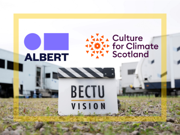 Photo of a unit base with the BECTU Vision Clapper Board, Albert and Culture for Climate Scotland logos
